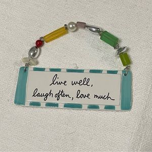 Sandra Magsamen ceramic plaque “live well, laugh often, love much”